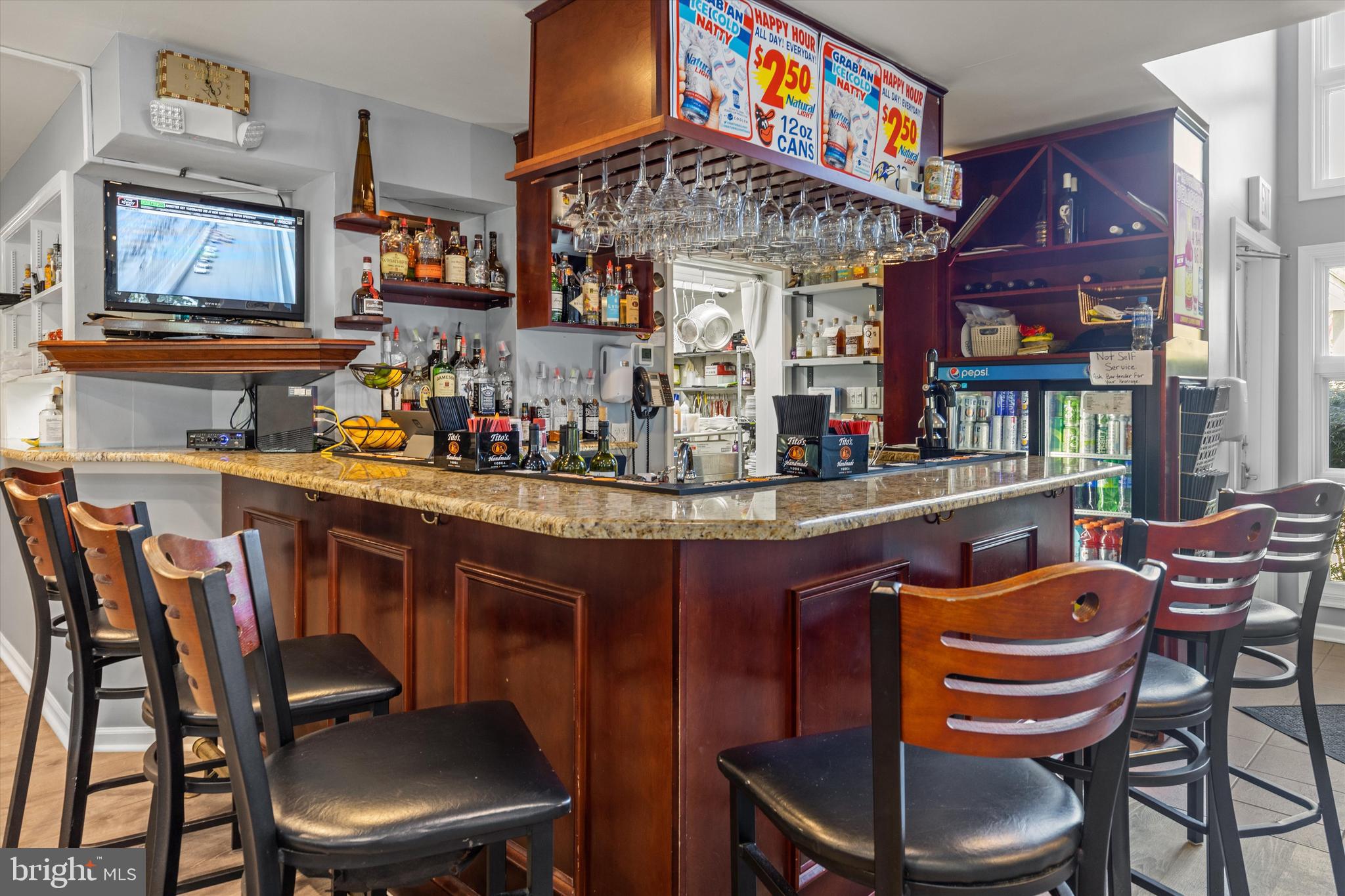 Lot #165 River Run Lane Berlin, MD 21811 - Photo 29 of 42 a room with stainless steel appliances a dining table and chairs