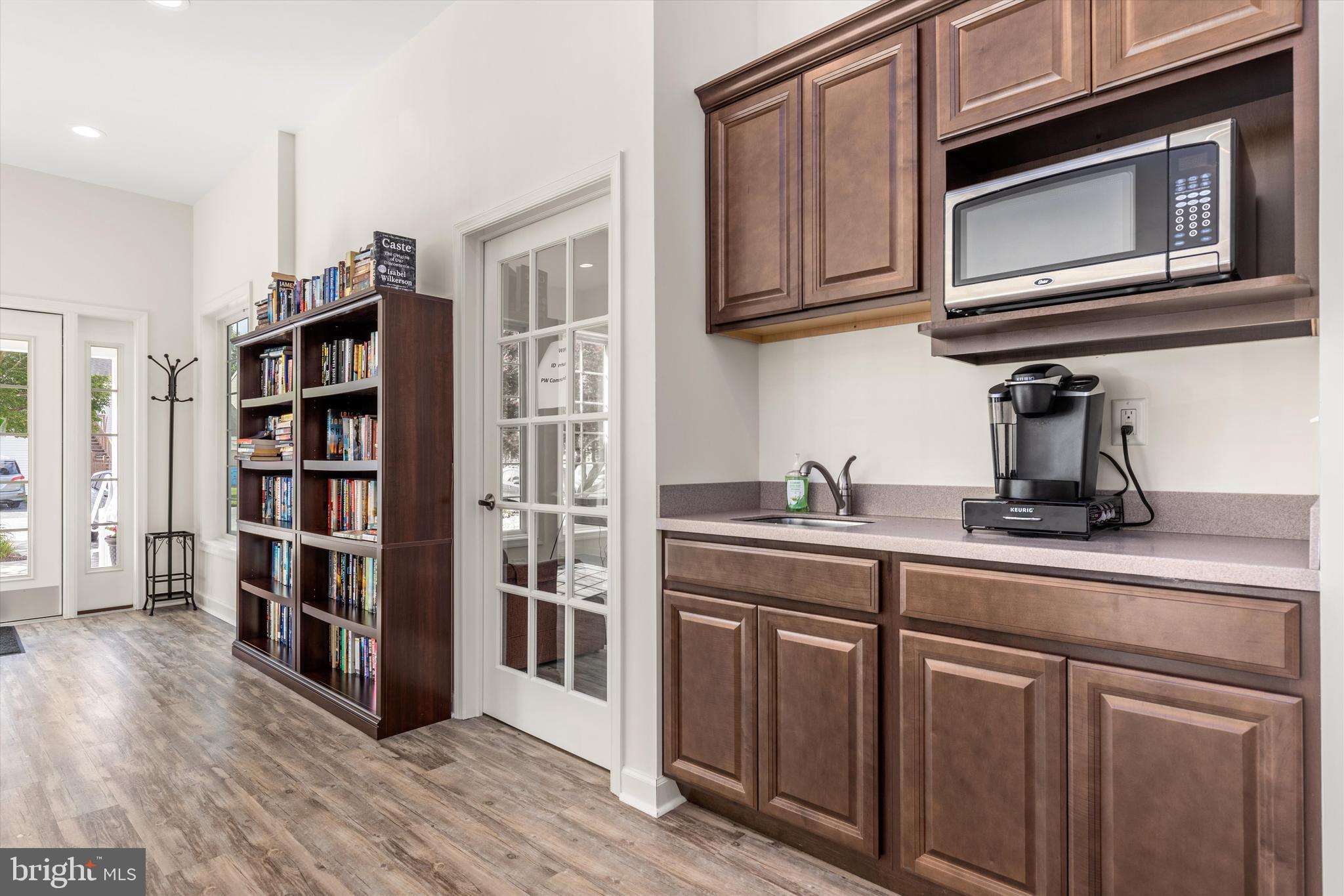 Lot #165 River Run Lane Berlin, MD 21811 - Photo 36 of 42 a kitchen with stainless steel appliances granite countertop a refrigerator and cabinets