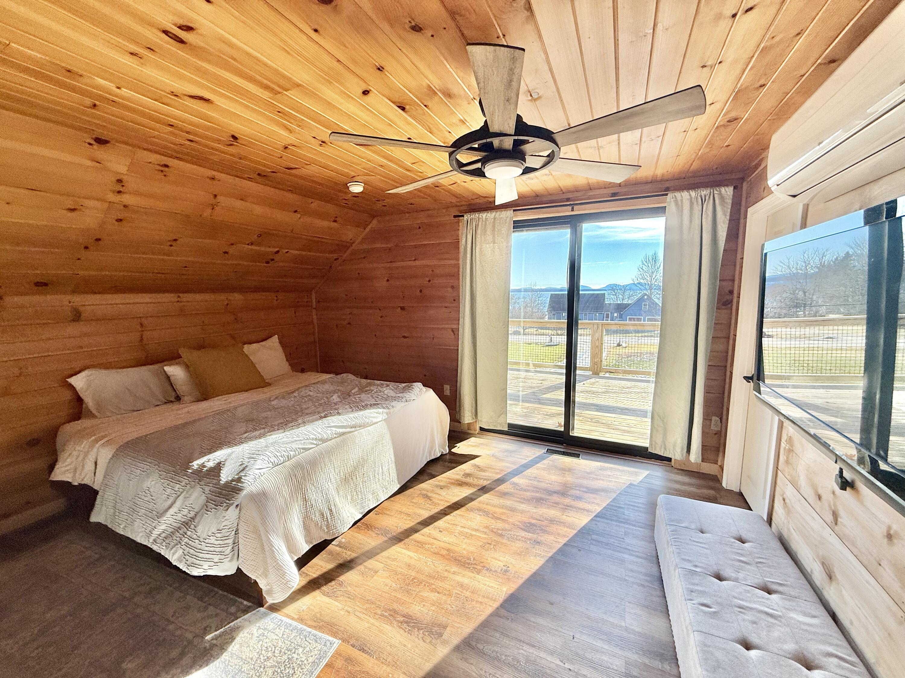 967 Newbury Neck Road Surry, ME 04684 - Photo 22 of 54 Upstairs Master Bedroom