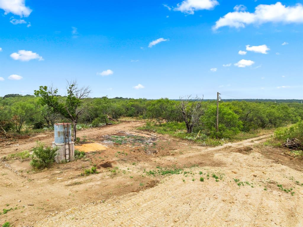 7756 County Road 241 Clyde, TX 79510 - Photo 13 of 40 a view of a road with a yard