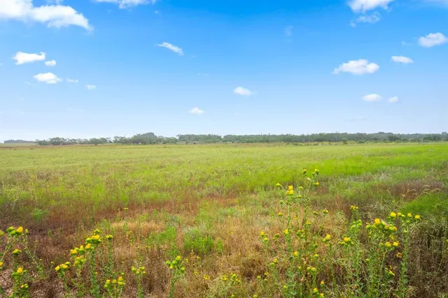 a view of an ocean and a mountain