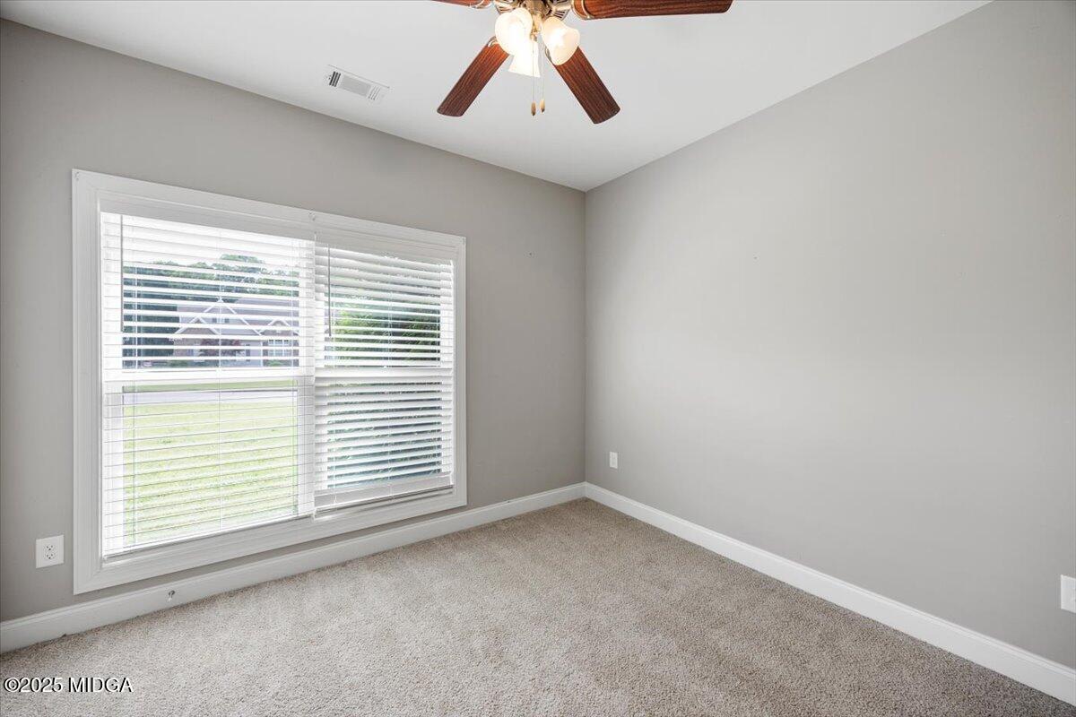 14 Carters Way Forsyth, GA 31029 - Photo 13 of 23 a view of a livingroom with a large window