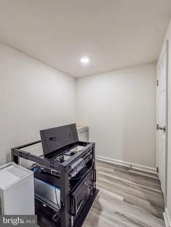 a stove top oven sitting inside of a kitchen