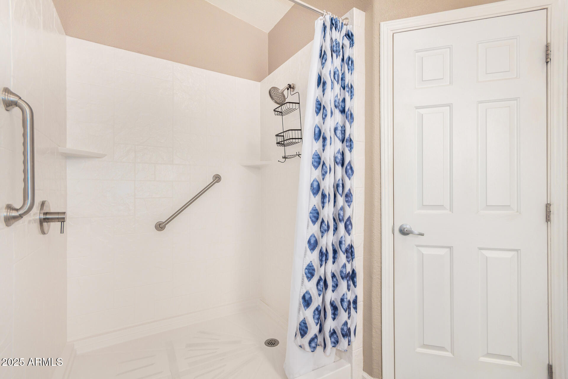 3301 South Goldfield Road, Unit 1002 Apache Junction, AZ 85119 - Photo 15 of 25 a bathroom with a shower curtain and a shower curtain