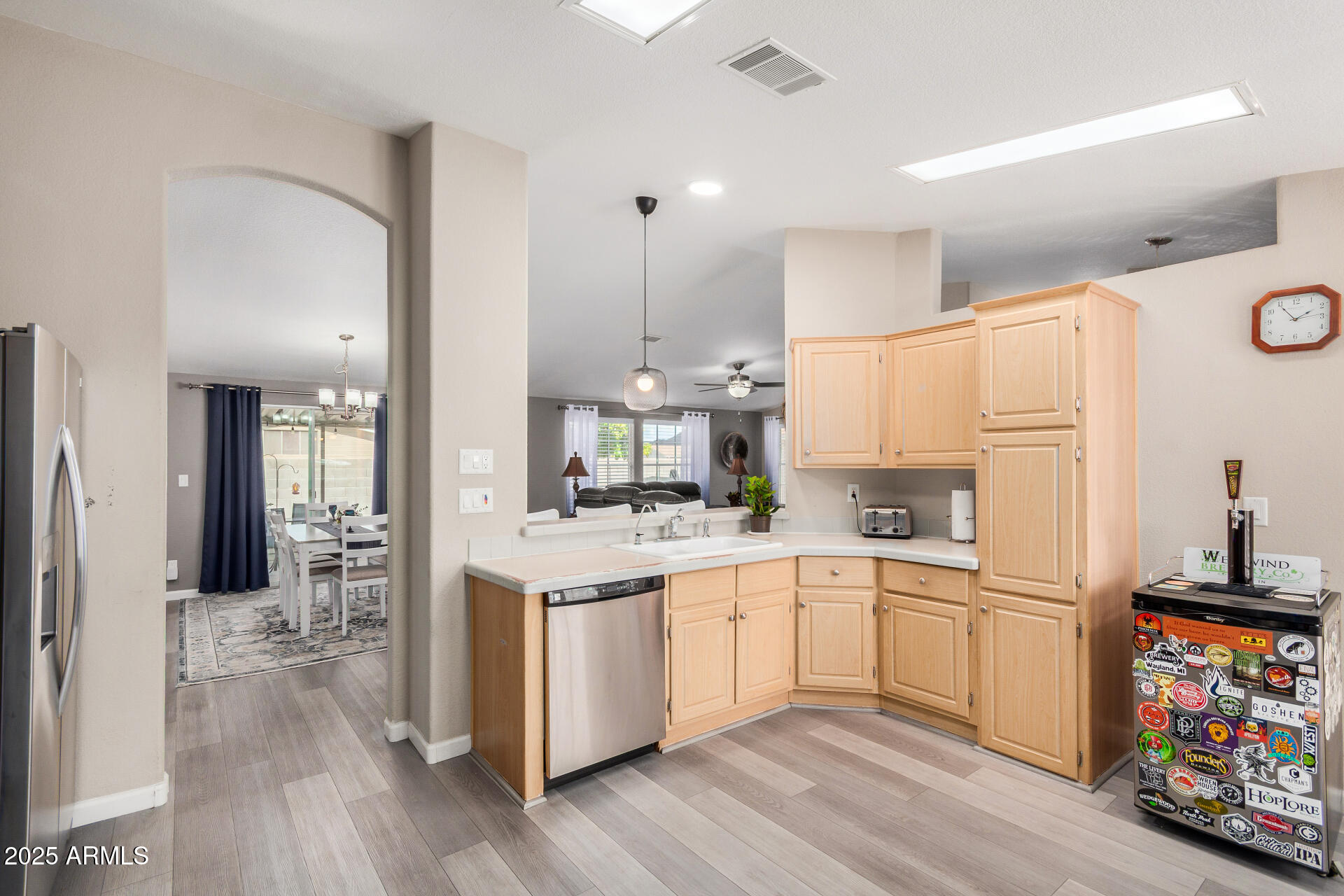 3301 South Goldfield Road, Unit 1002 Apache Junction, AZ 85119 - Photo 10 of 25 a kitchen with appliances a sink and cabinets