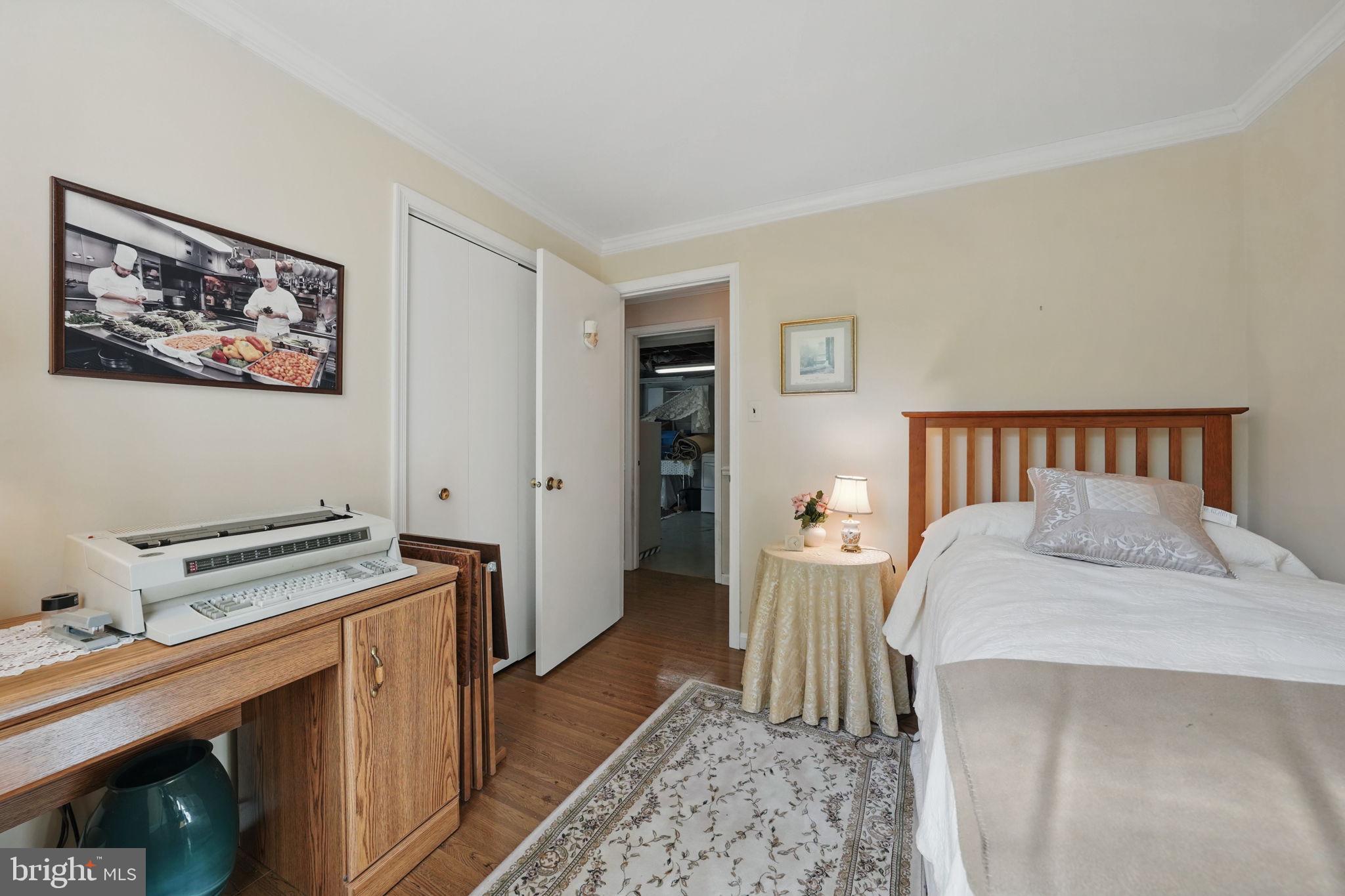 4602 Old Mill Road Alexandria, VA 22309 - Photo 14 of 46 a bedroom with furniture and a window