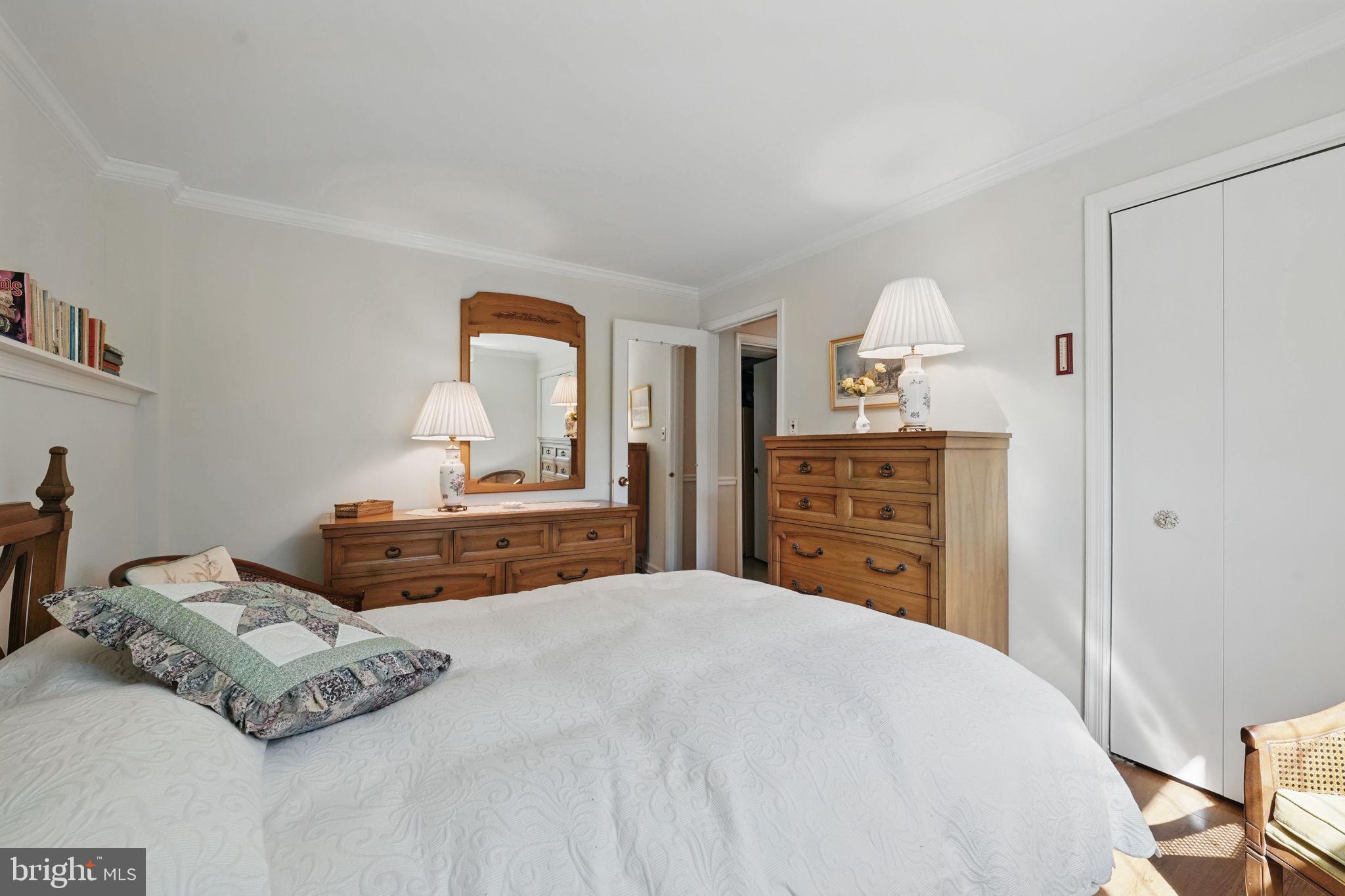 4602 Old Mill Road Alexandria, VA 22309 - Photo 16 of 46 a bedroom with a bed and a dresser