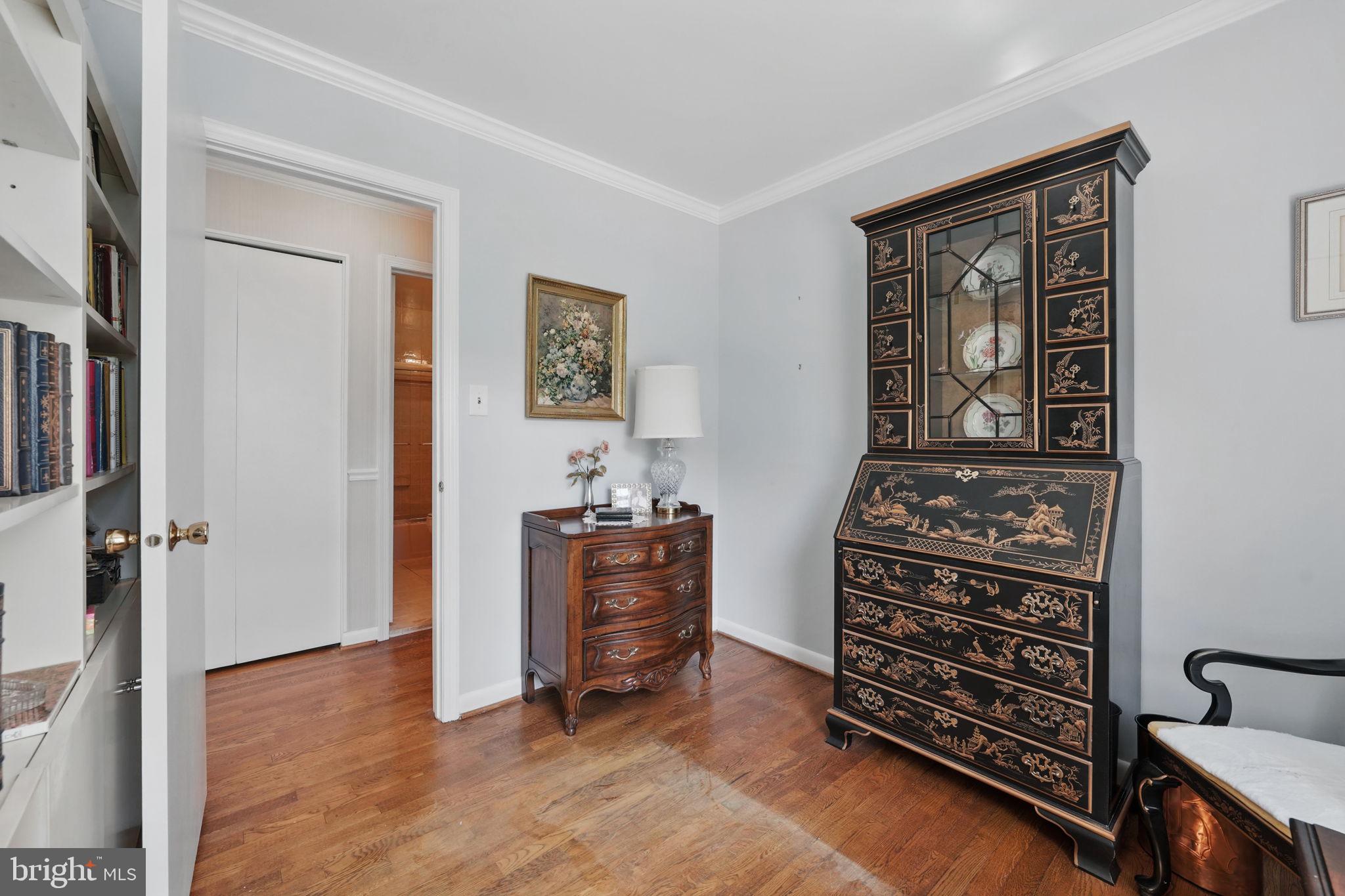 4602 Old Mill Road Alexandria, VA 22309 - Photo 19 of 46 a view of a bedroom with baby crib and a window