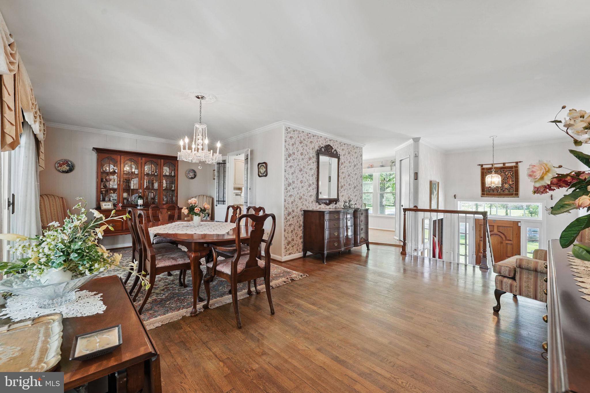 4602 Old Mill Road Alexandria, VA 22309 - Photo 27 of 46 a view of a dining room with furniture and wooden floor
