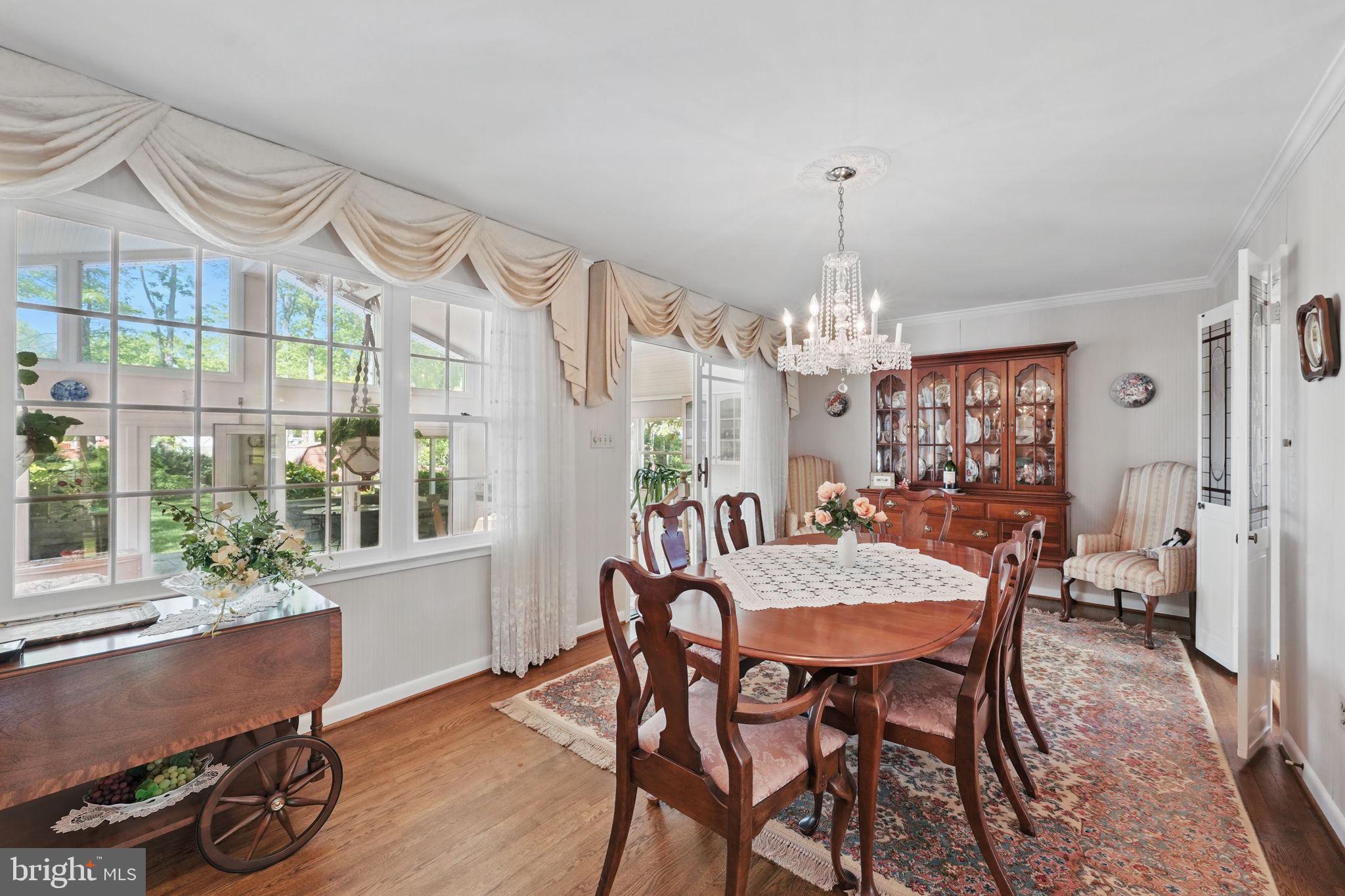 4602 Old Mill Road Alexandria, VA 22309 - Photo 28 of 46 a view of a dining room with furniture window and wooden floor