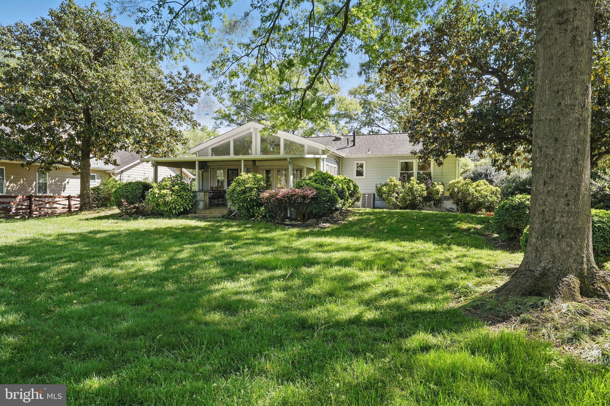4602 Old Mill Road Alexandria, VA 22309 - Photo 40 of 46 a front view of house with yard and green space