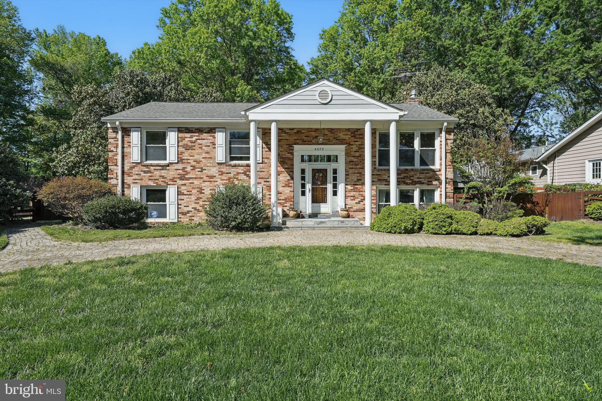 4602 Old Mill Road Alexandria, VA 22309 - Photo 46 of 46 a front view of a house with garden