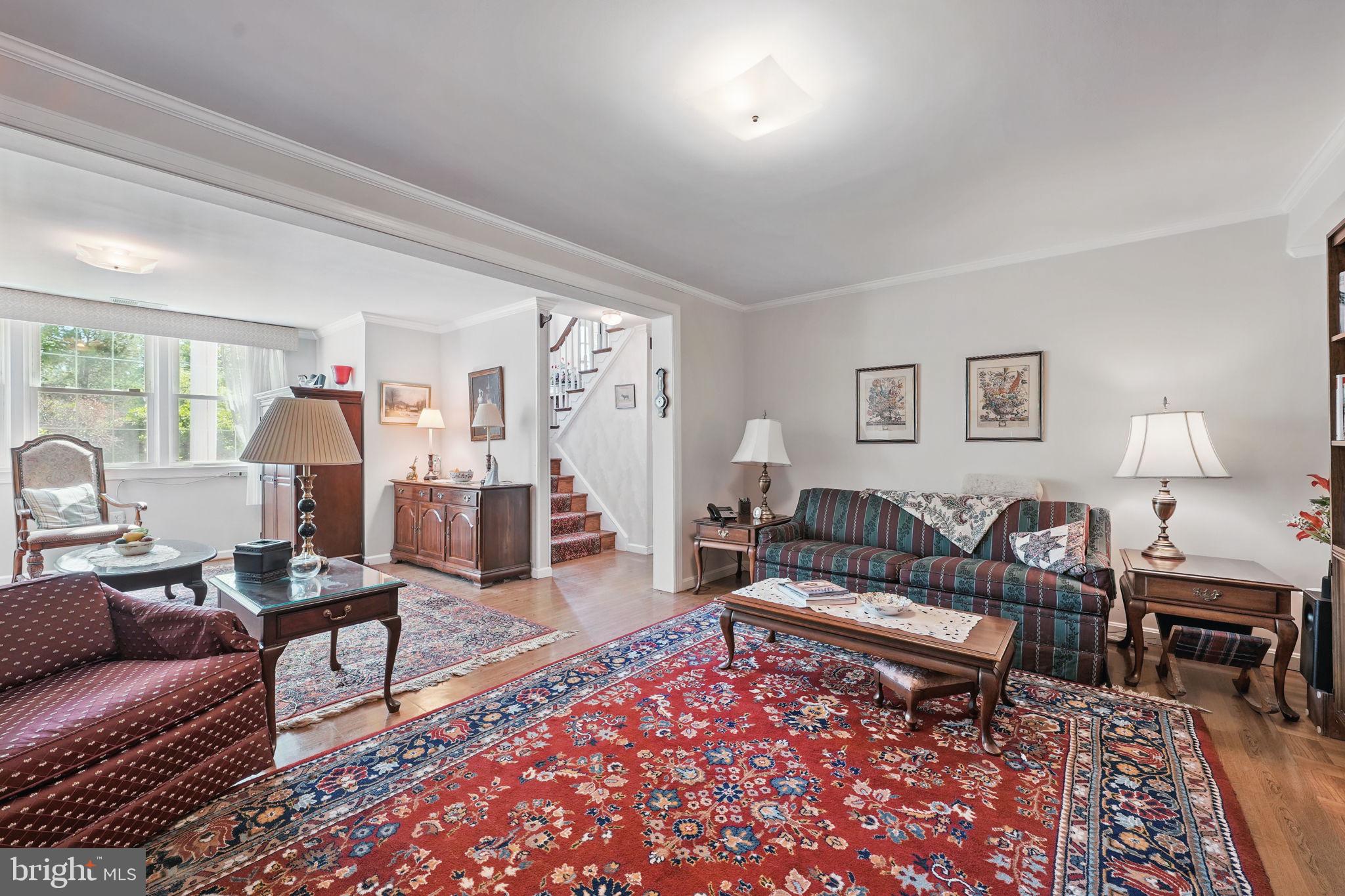 4602 Old Mill Road Alexandria, VA 22309 - Photo 9 of 46 a living room with furniture and a rug