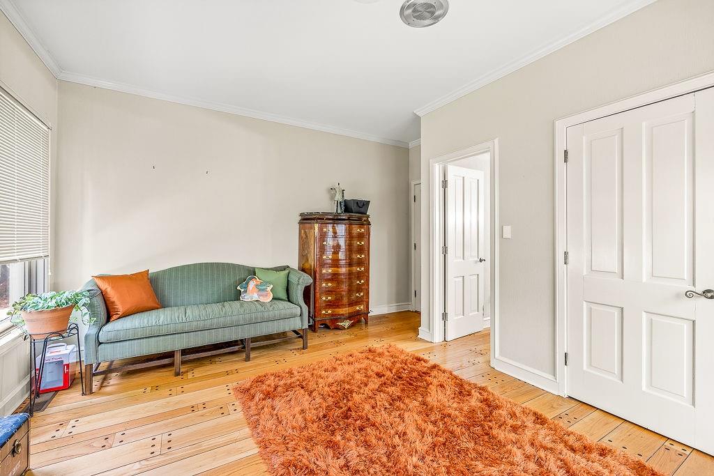 8569 Jefferson Road Commerce, GA 30529 - Photo 28 of 82 a living room with furniture and a wooden floor
