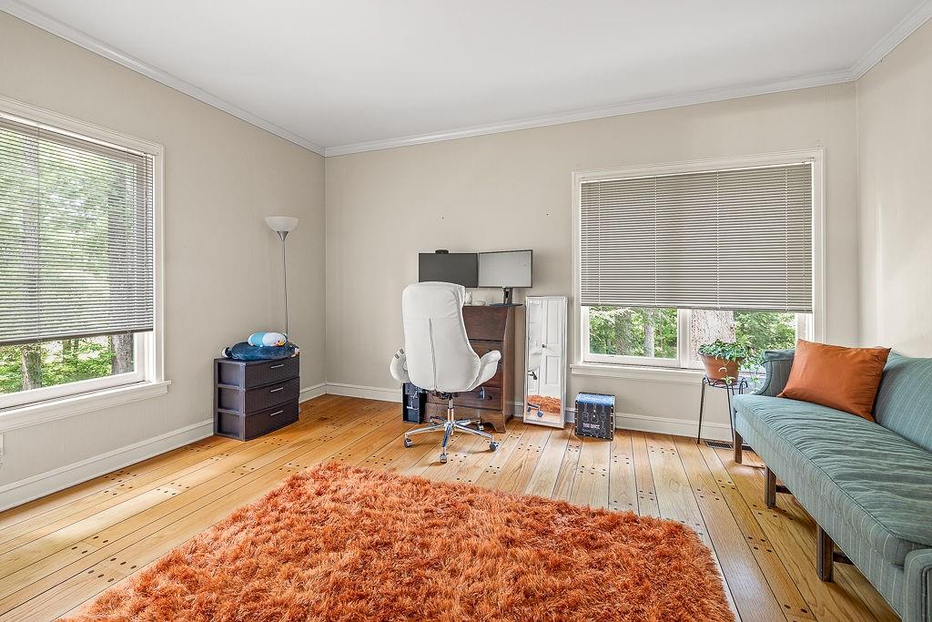 8569 Jefferson Road Commerce, GA 30529 - Photo 29 of 82 a living room with furniture and a large window