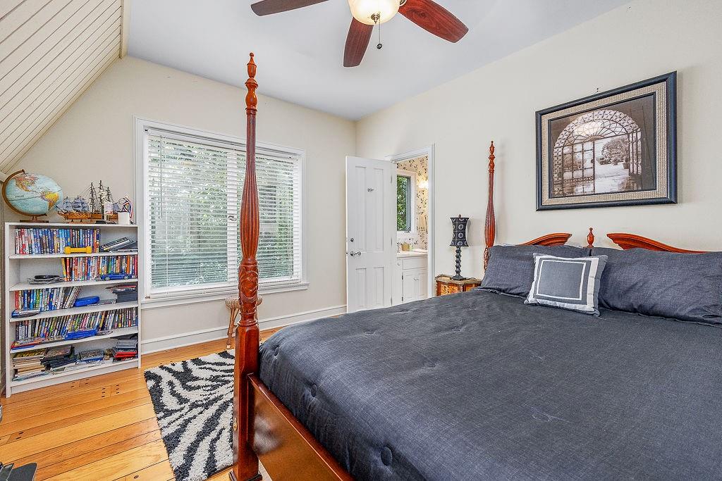 8569 Jefferson Road Commerce, GA 30529 - Photo 48 of 82 a bedroom with a bed and a book shelf