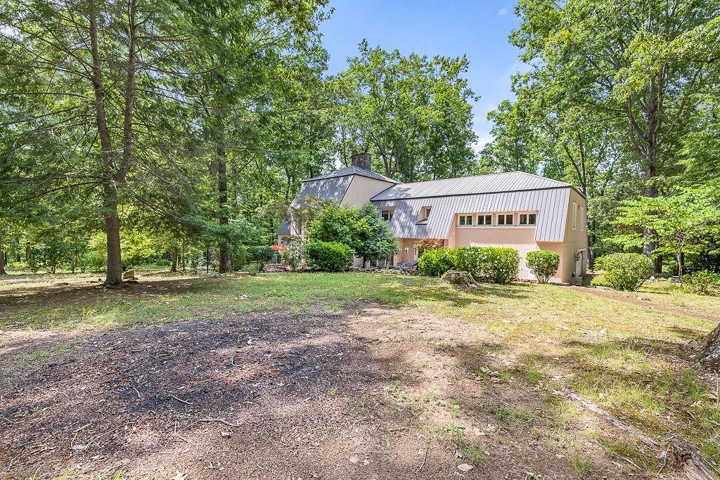 8569 Jefferson Road Commerce, GA 30529 - Photo 64 of 82 a sign board in front of a house with a yard