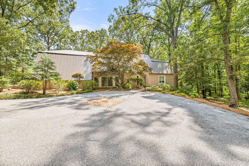 8569 Jefferson Road Commerce, GA 30529 - Photo 66 of 82 front view of a house with a street