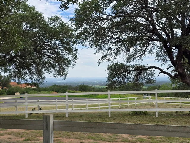 a view of a swimming pool with an outdoor space and seating area