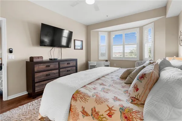 a room with wooden furniture and window