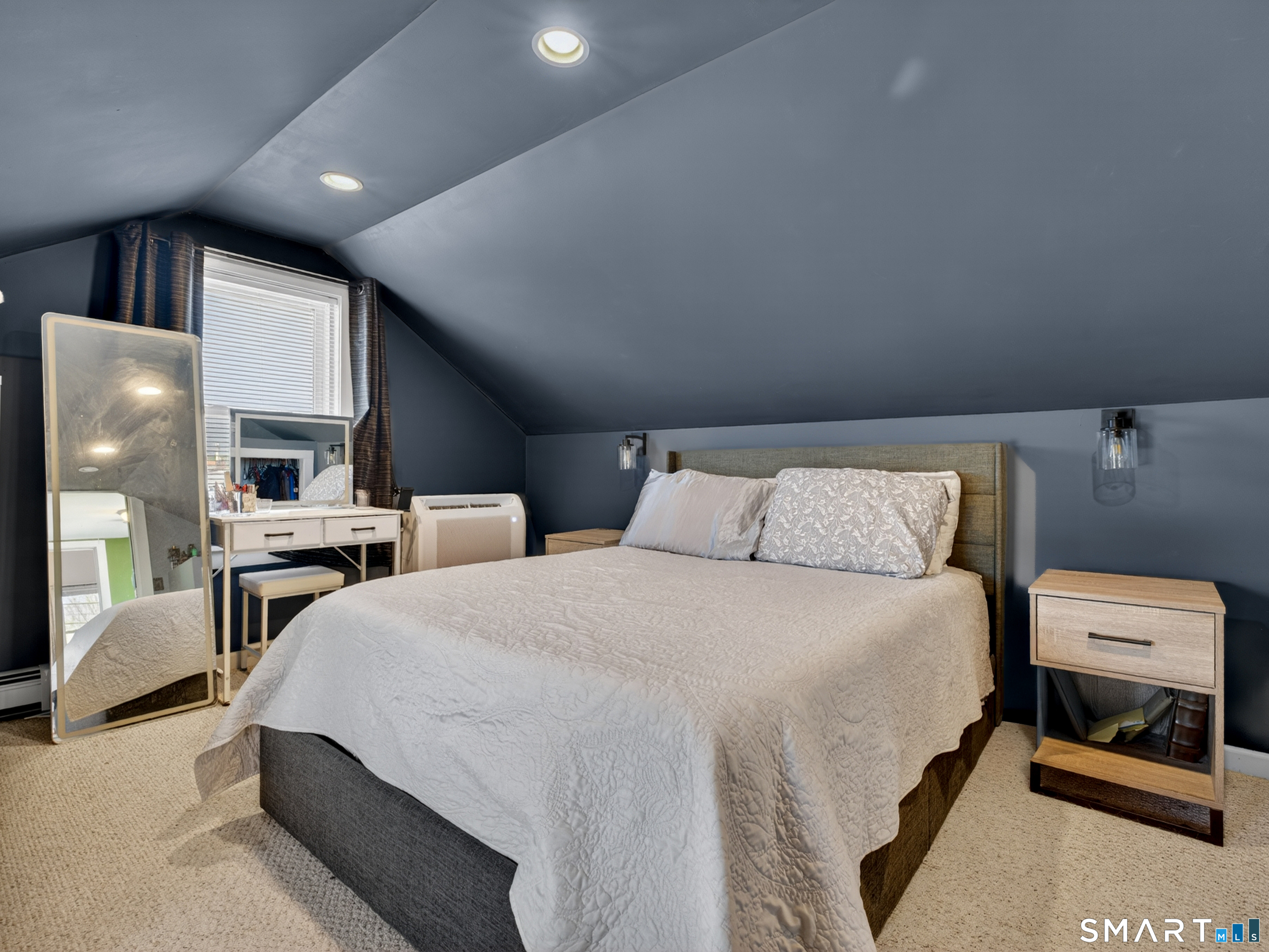 13 Oak Street Groton, CT 06340 - Photo 20 of 38 a bedroom with bed and a chandelier