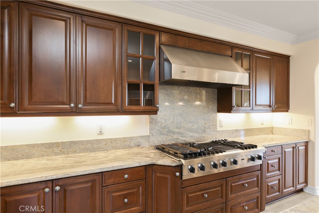 18 Vernon Newport Coast, CA 92657 - Photo 14 of 52 a kitchen with granite countertop stainless steel appliances and cabinets