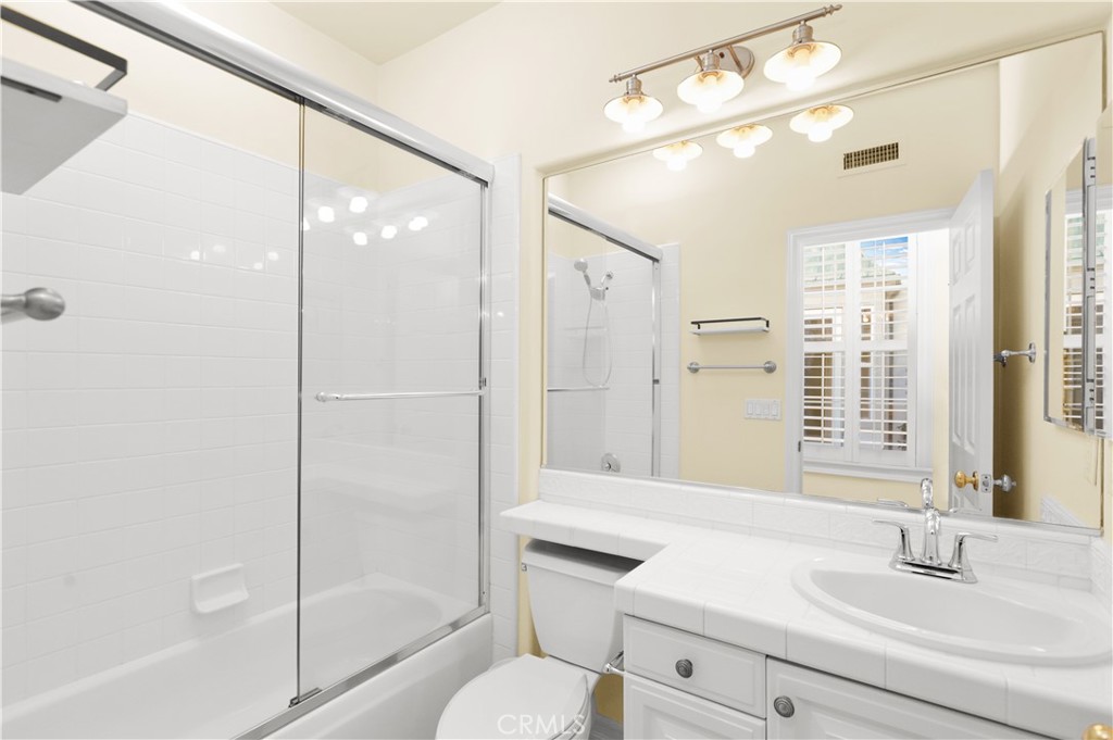18 Vernon Newport Coast, CA 92657 - Photo 23 of 52 a bathroom with a sink toilet and shower