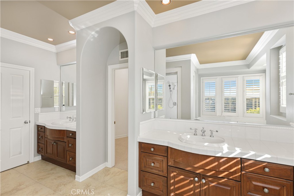 18 Vernon Newport Coast, CA 92657 - Photo 28 of 52 a bathroom with a granite countertop sink and a bathtub