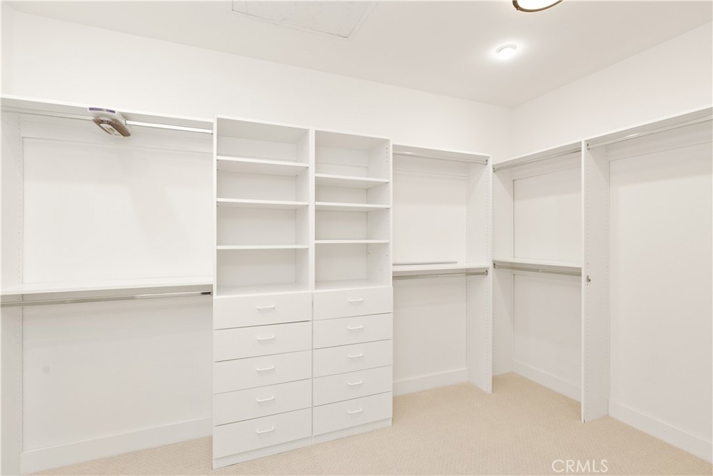 18 Vernon Newport Coast, CA 92657 - Photo 31 of 52 a view of walk in closet with empty racks