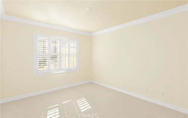 a bathroom with a sink double vanity and a mirror