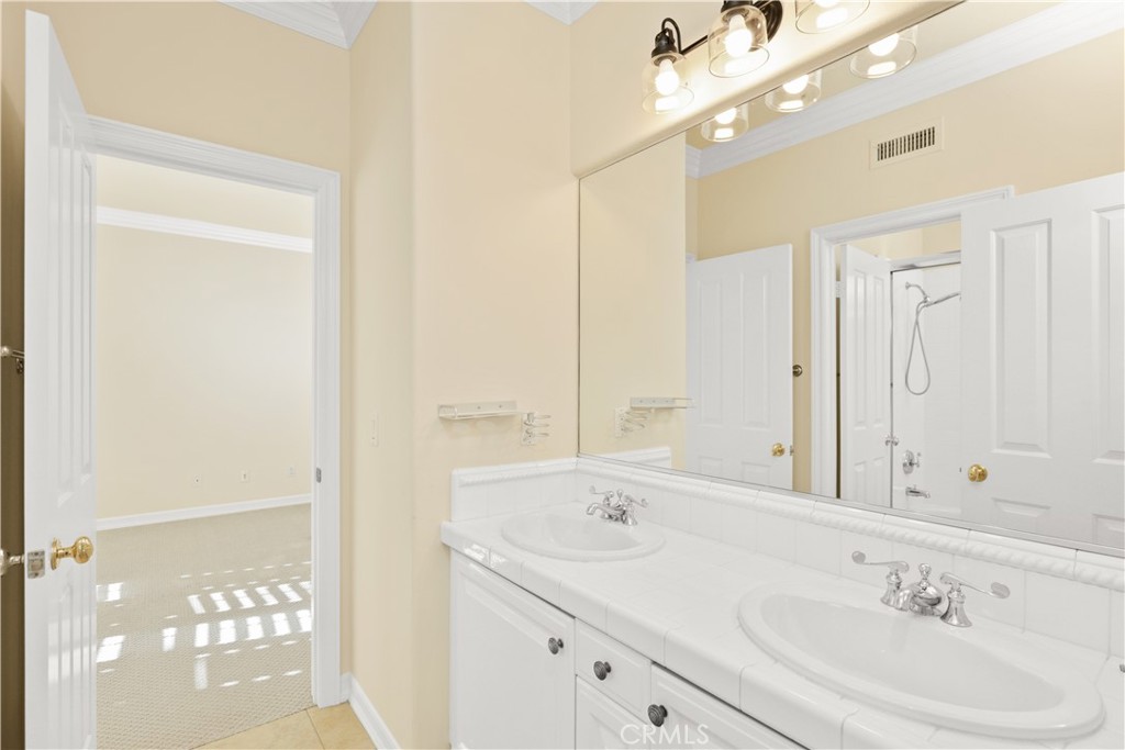 18 Vernon Newport Coast, CA 92657 - Photo 36 of 52 a bathroom with a sink double vanity and a mirror