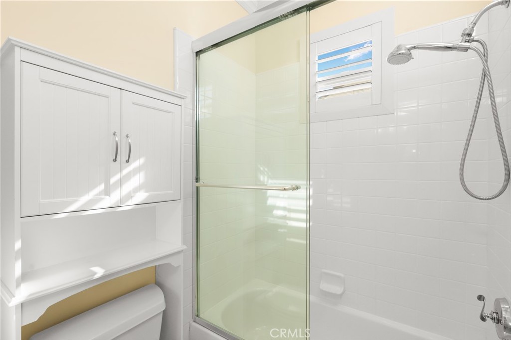 18 Vernon Newport Coast, CA 92657 - Photo 37 of 52 a bathroom with a glass shower door