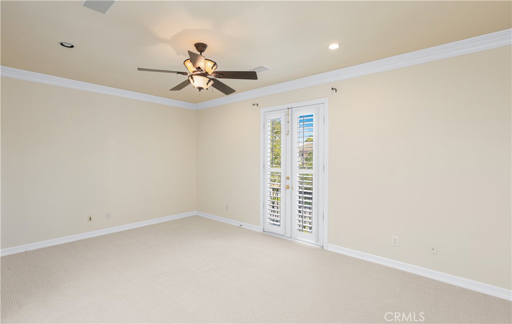 18 Vernon Newport Coast, CA 92657 - Photo 40 of 52 an empty room with windows and fan