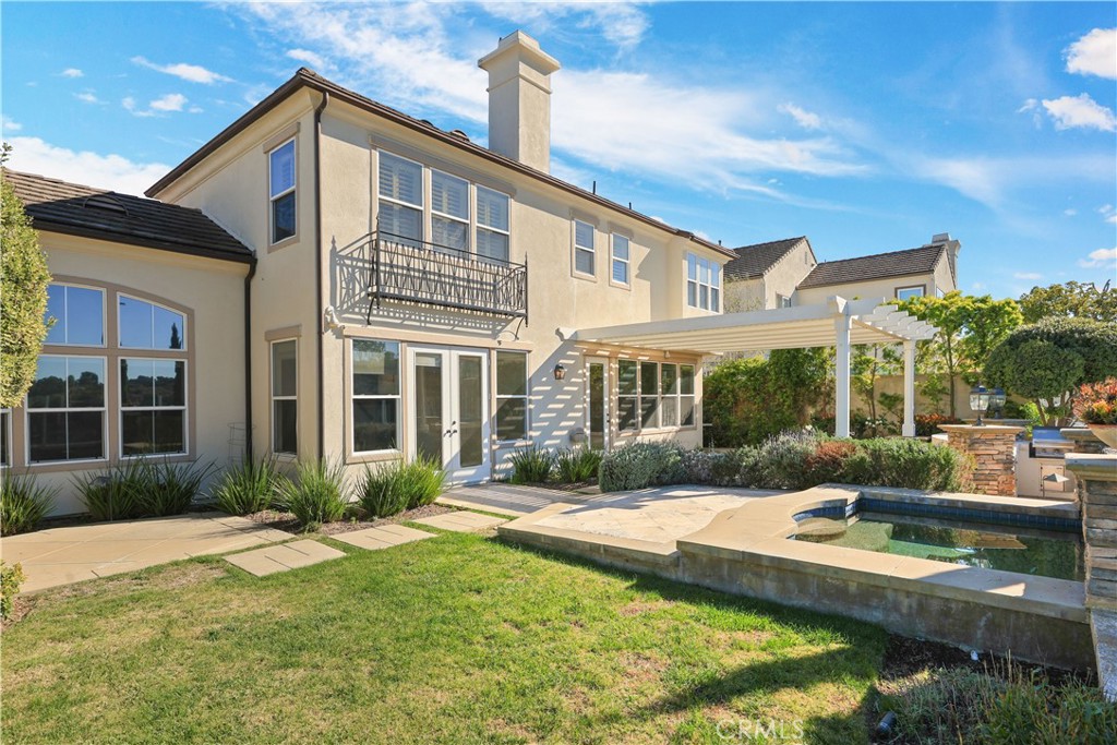 18 Vernon Newport Coast, CA 92657 - Photo 42 of 52 a view of a house with swimming pool and porch with furniture