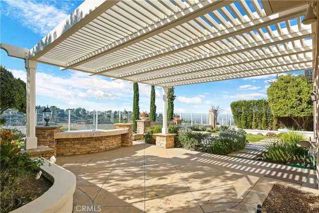 a view of a kitchen with a stove and a microwave oven