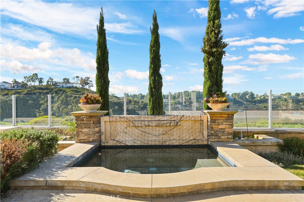 18 Vernon Newport Coast, CA 92657 - Photo 44 of 52 a view of swimming pool with couches and sky view