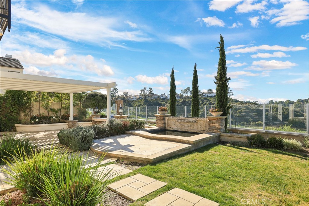 18 Vernon Newport Coast, CA 92657 - Photo 47 of 52 a view of a patio with swimming pool and table and chairs
