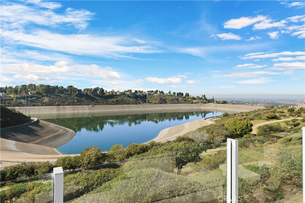 18 Vernon Newport Coast, CA 92657 - Photo 48 of 52 a view of a lake with houses in the back