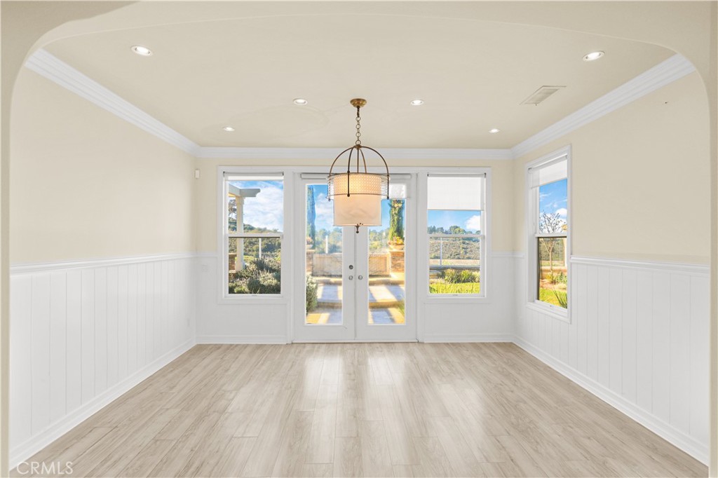 18 Vernon Newport Coast, CA 92657 - Photo 6 of 52 an empty room with wooden floor and windows