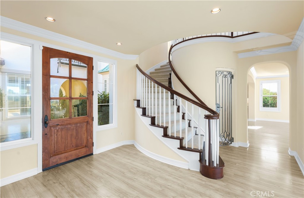 18 Vernon Newport Coast, CA 92657 - Photo 10 of 52 a view of an entryway with wooden floor and windows