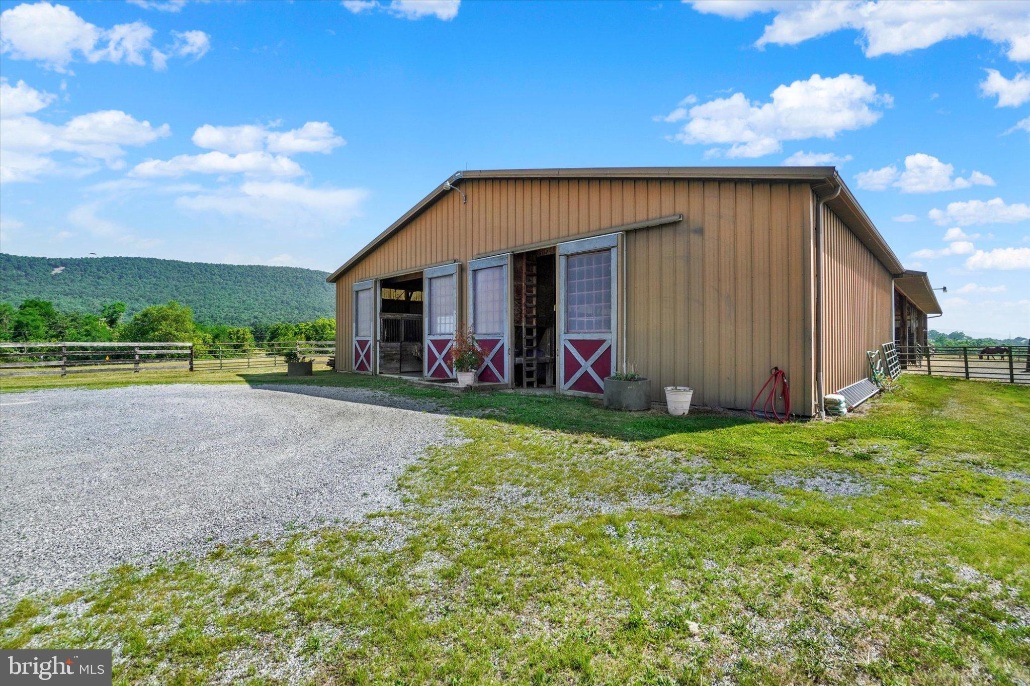 255 Sheaffer Road Carlisle, PA 17013 - Photo 14 of 32 Charming barn with scenic backdrop.