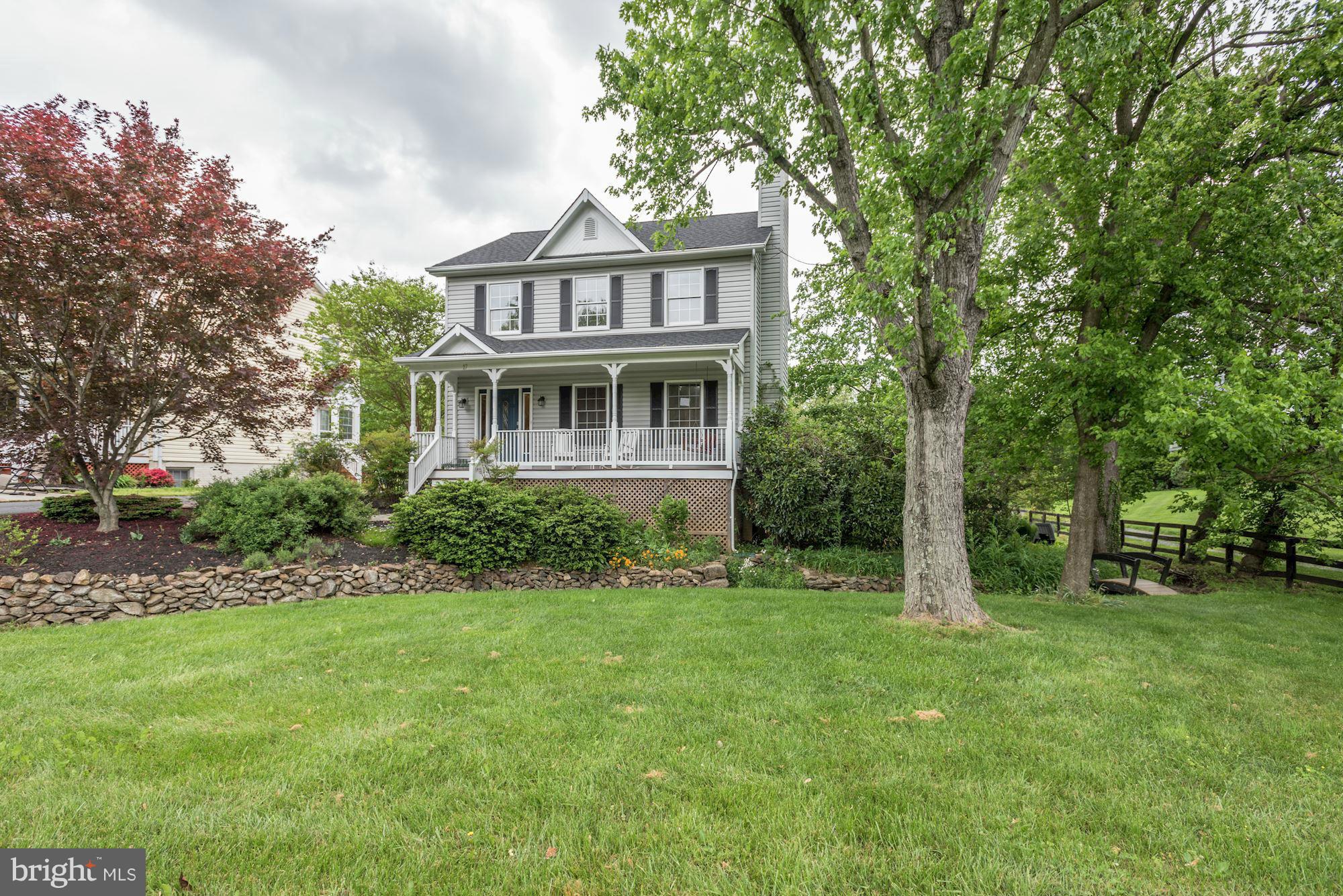 17 New Cut Road Round Hill, VA 20141 - Photo 1 of 29 a view of a house with a yard and sitting area