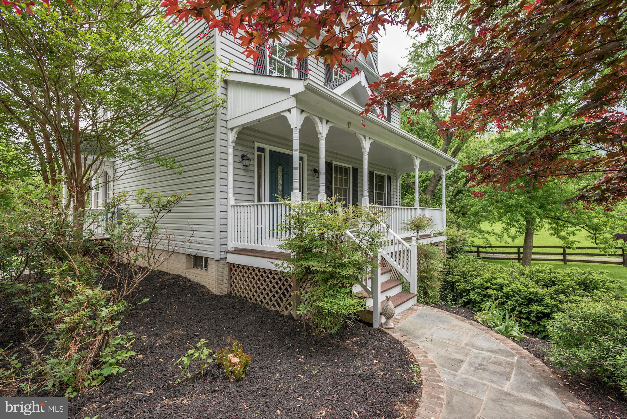 17 New Cut Road Round Hill, VA 20141 - Photo 2 of 29 a view of a house with a yard and potted plants