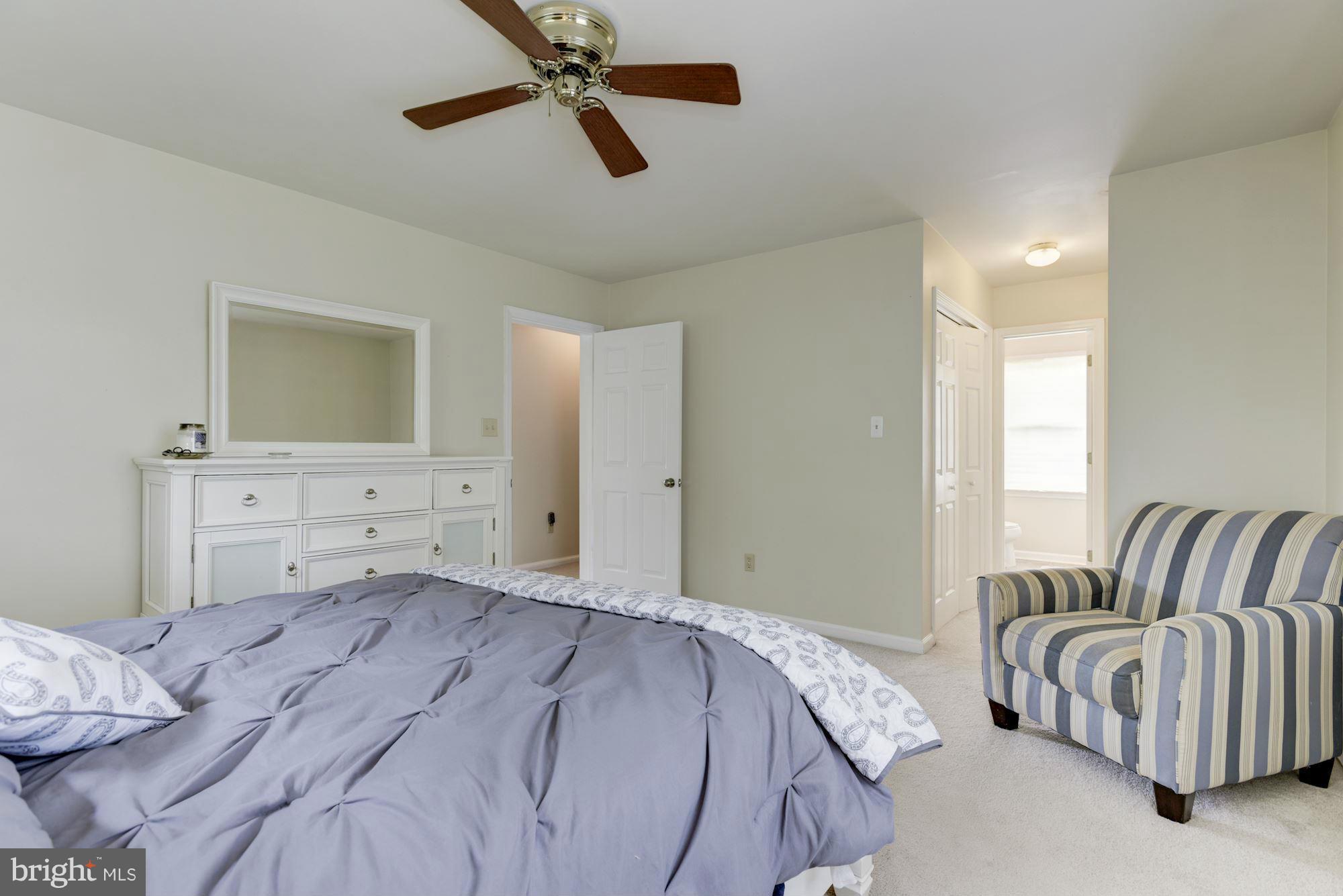17 New Cut Road Round Hill, VA 20141 - Photo 15 of 29 a bedroom with a bed and a couch