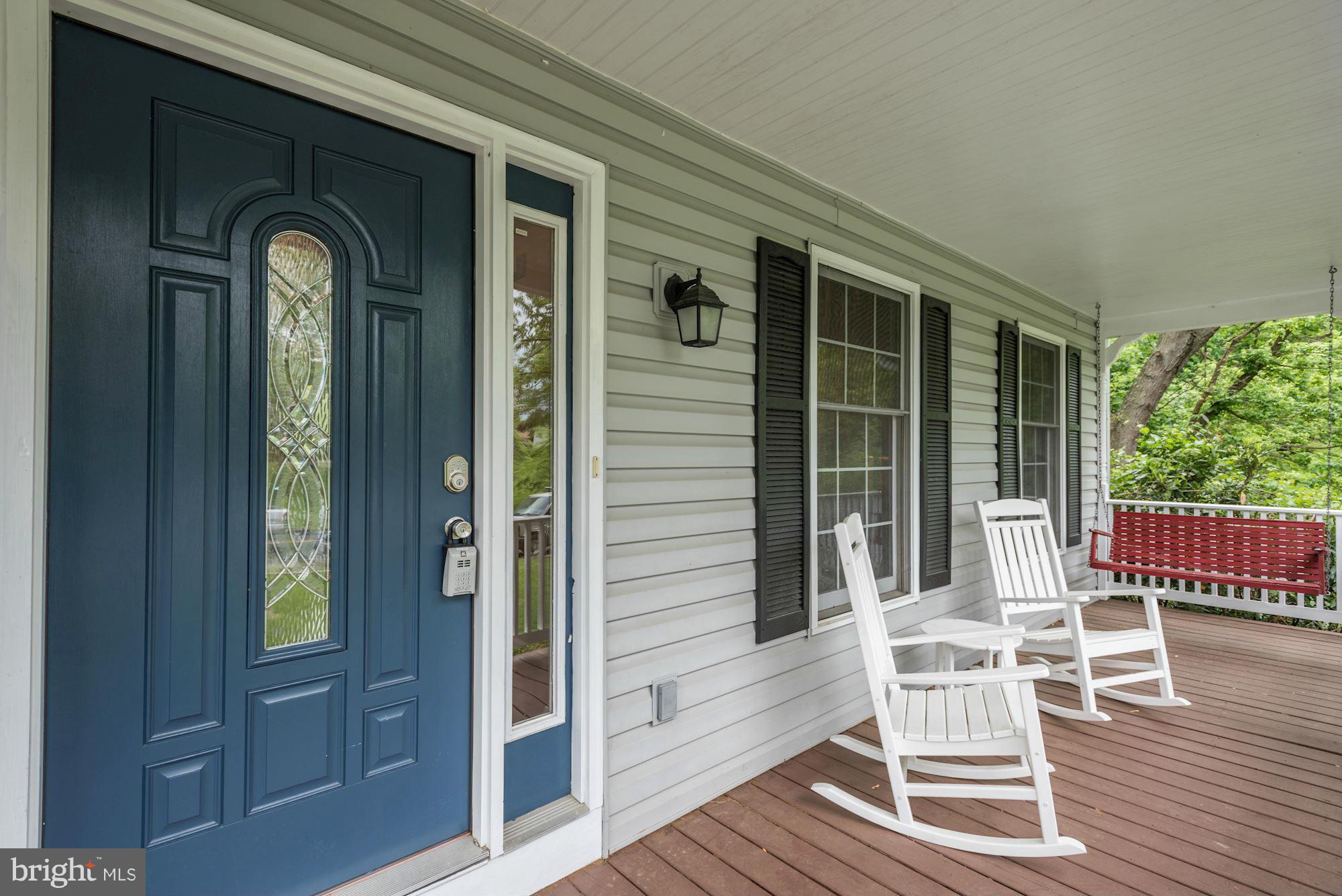 17 New Cut Road Round Hill, VA 20141 - Photo 3 of 29 a front view of a house with outdoor seating