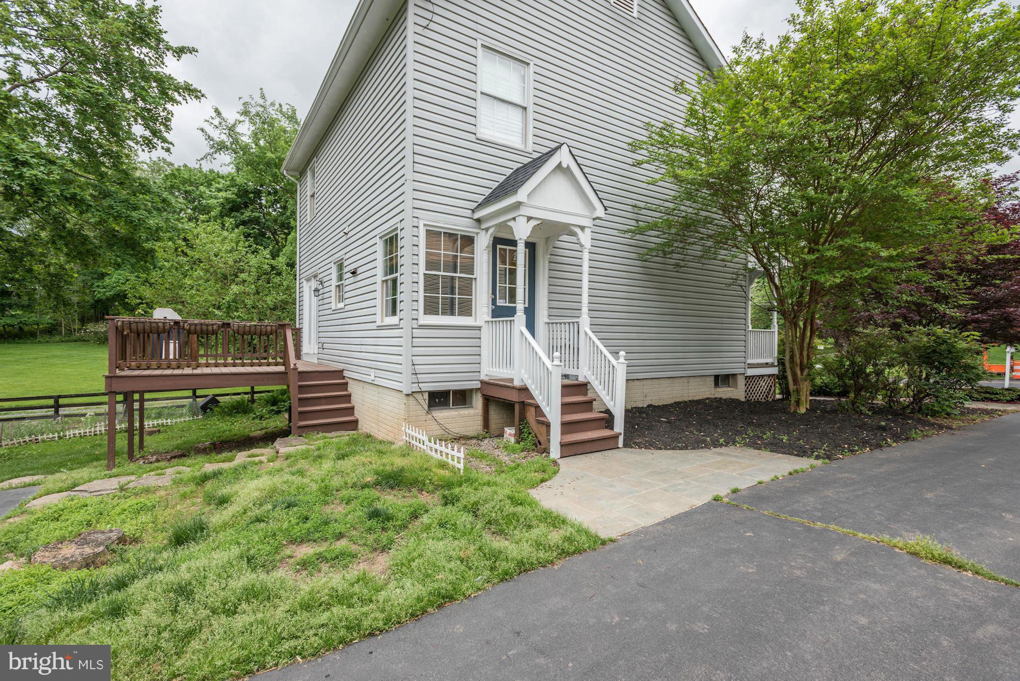 17 New Cut Road Round Hill, VA 20141 - Photo 25 of 29 a view of a house with a yard and sitting area
