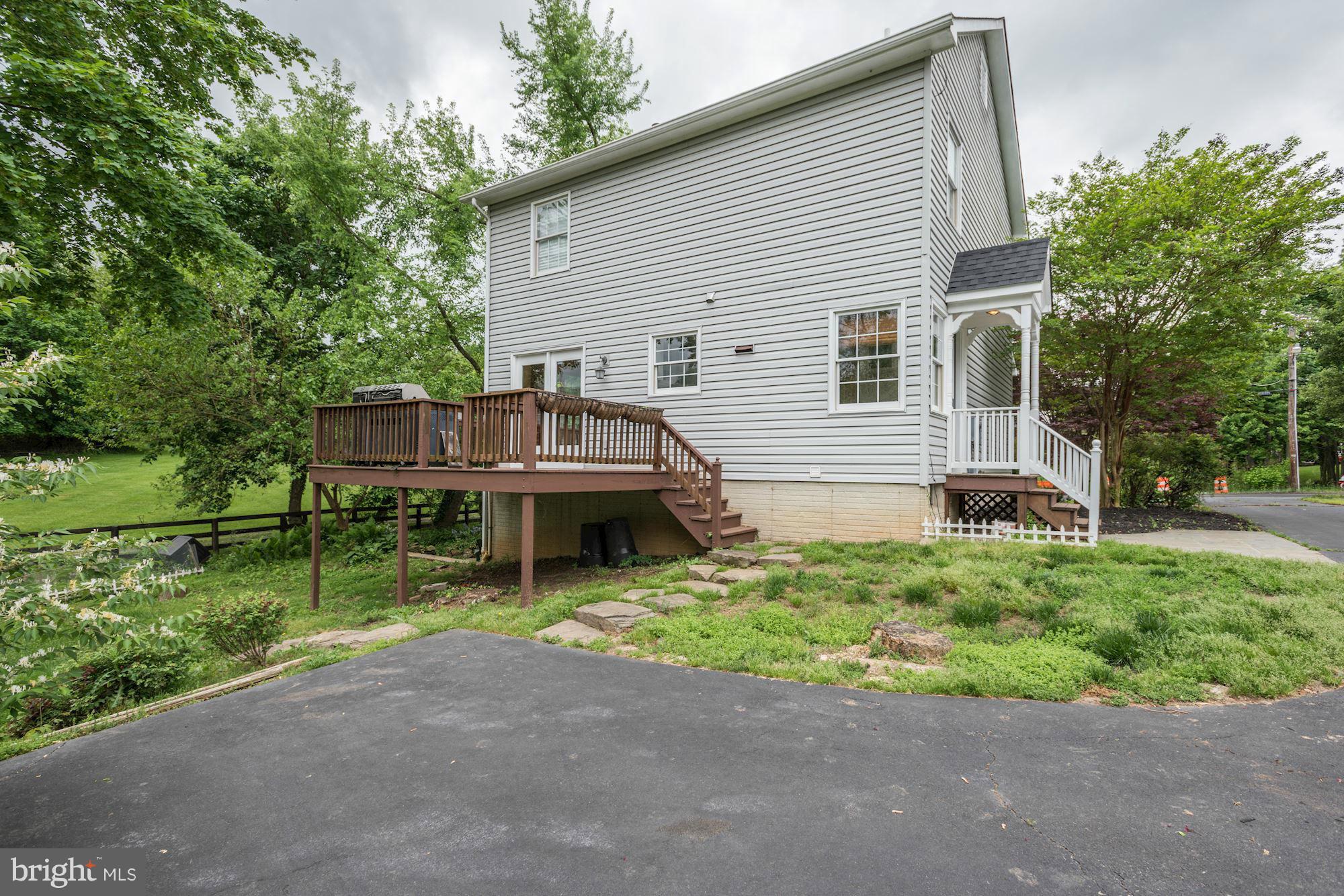 17 New Cut Road Round Hill, VA 20141 - Photo 26 of 29 a view of a house with a yard and sitting area