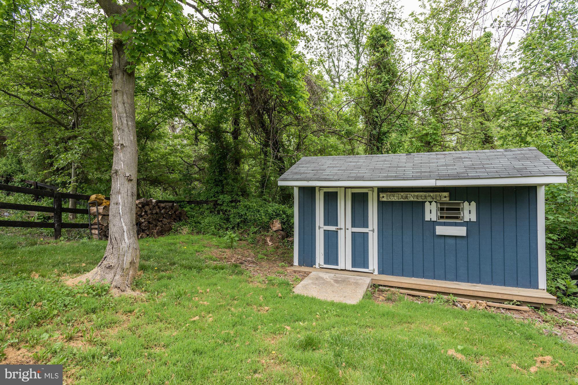 17 New Cut Road Round Hill, VA 20141 - Photo 29 of 29 a backyard of a house with lots of green space