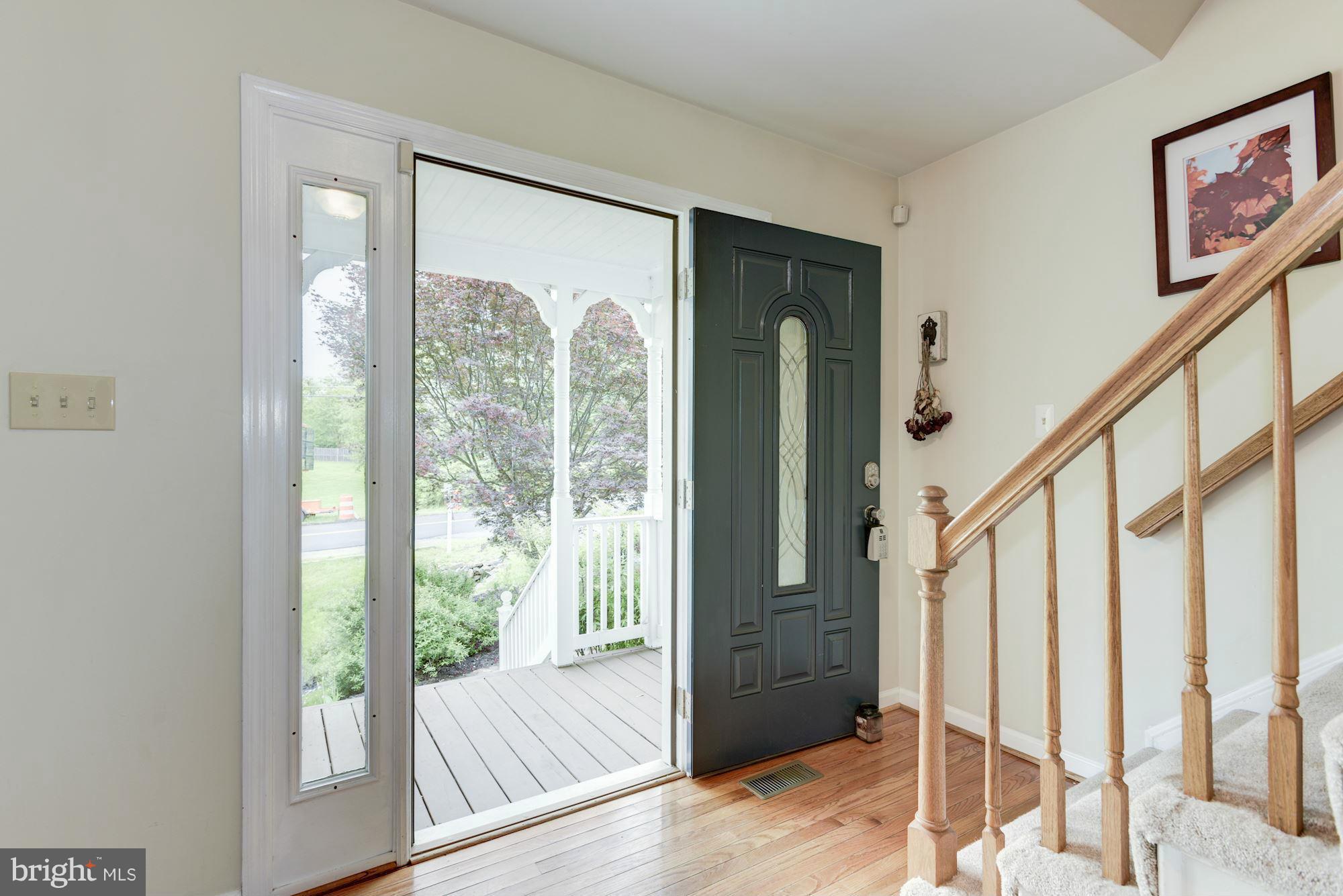 17 New Cut Road Round Hill, VA 20141 - Photo 4 of 29 a view of an entryway with wooden floor and door