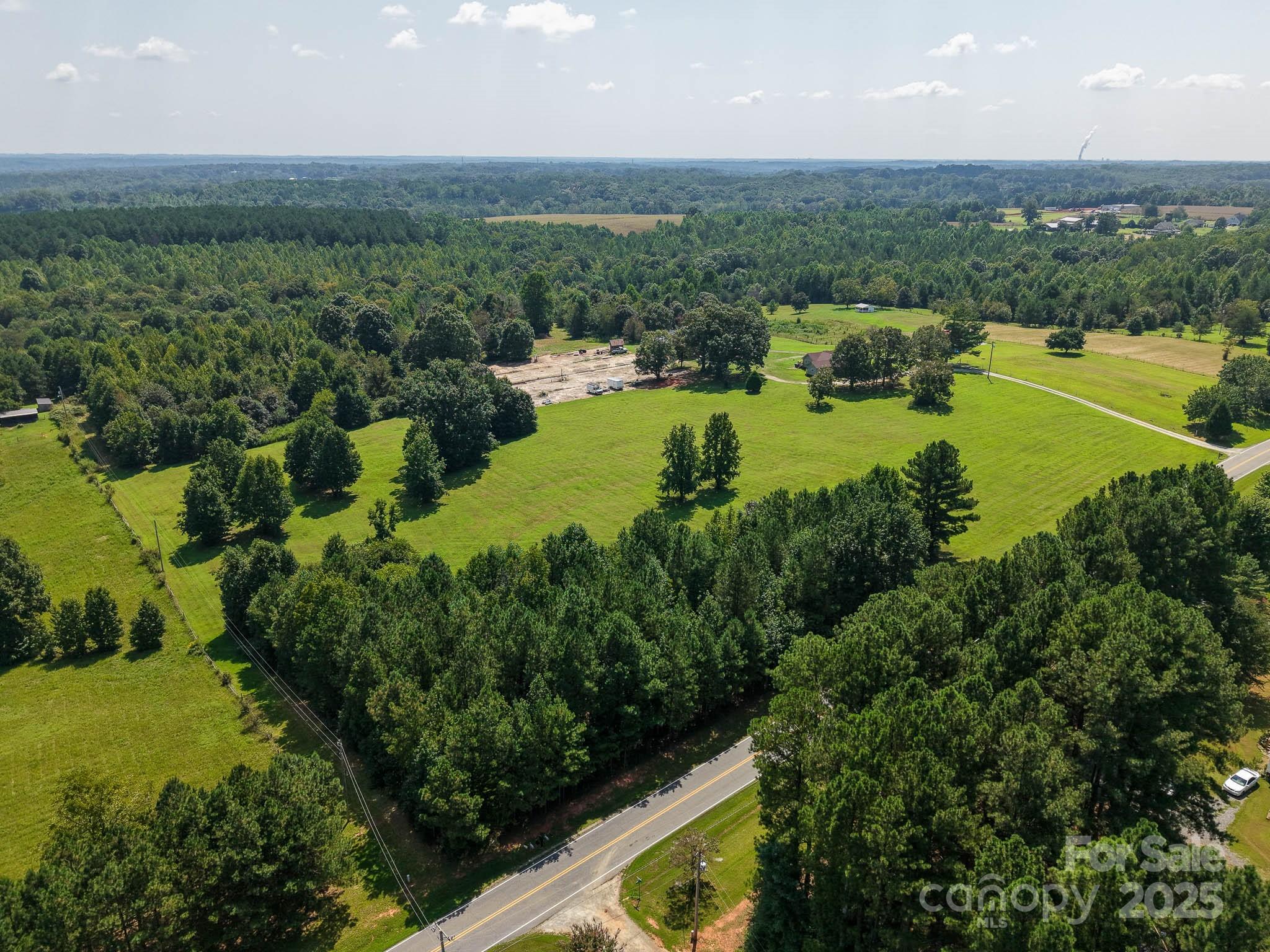 1818 Bolton Road Catawba, NC 28609 - Photo 3 of 4 a view of a lake with a city view